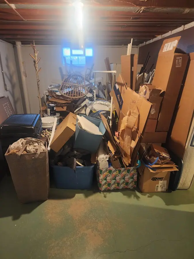 Roll-off dumpster container at job site for Concrete Dumpster Rental in Hanover